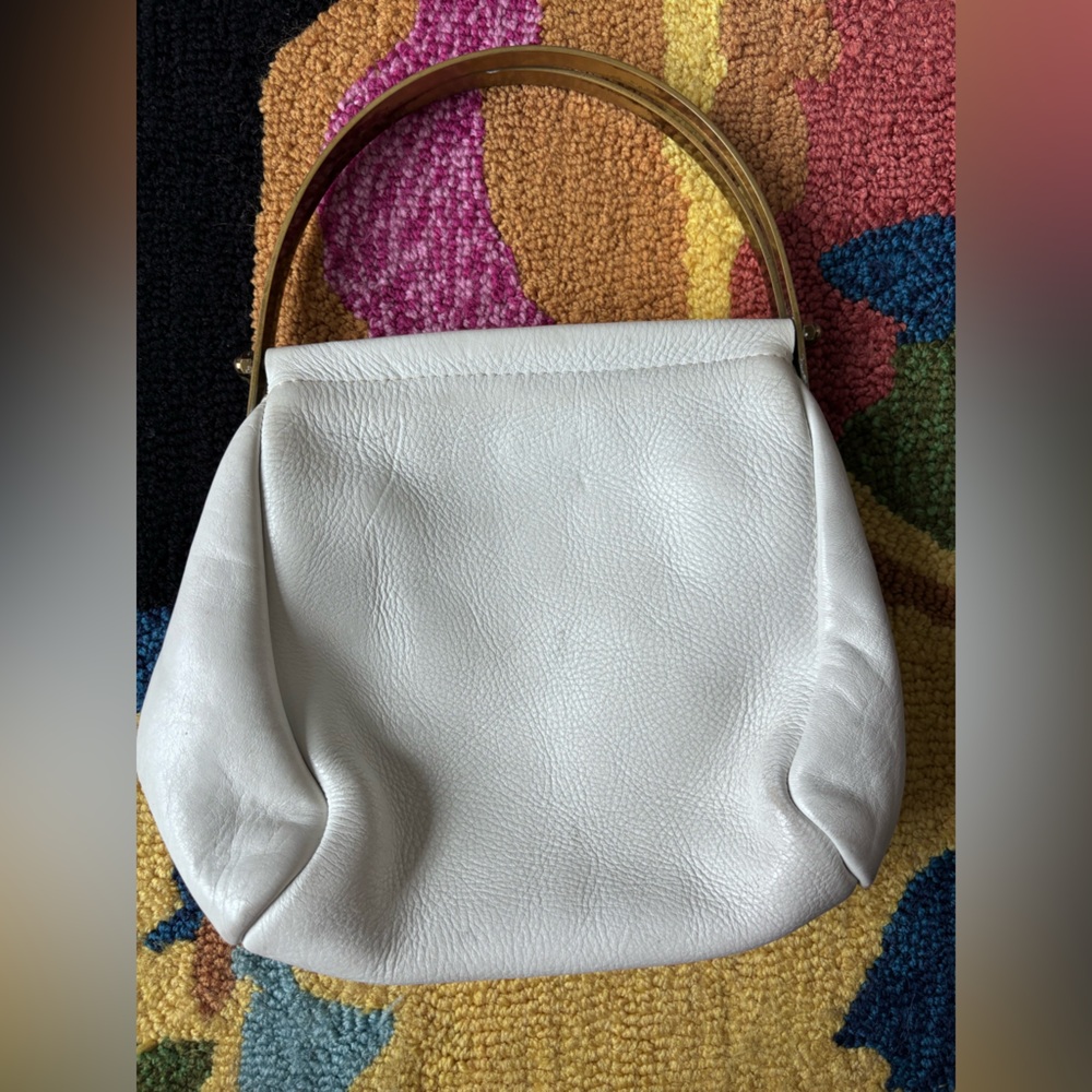 VINTAGE WHITE LEATHER BAG WITH BRASS HALF MOON HANDLES